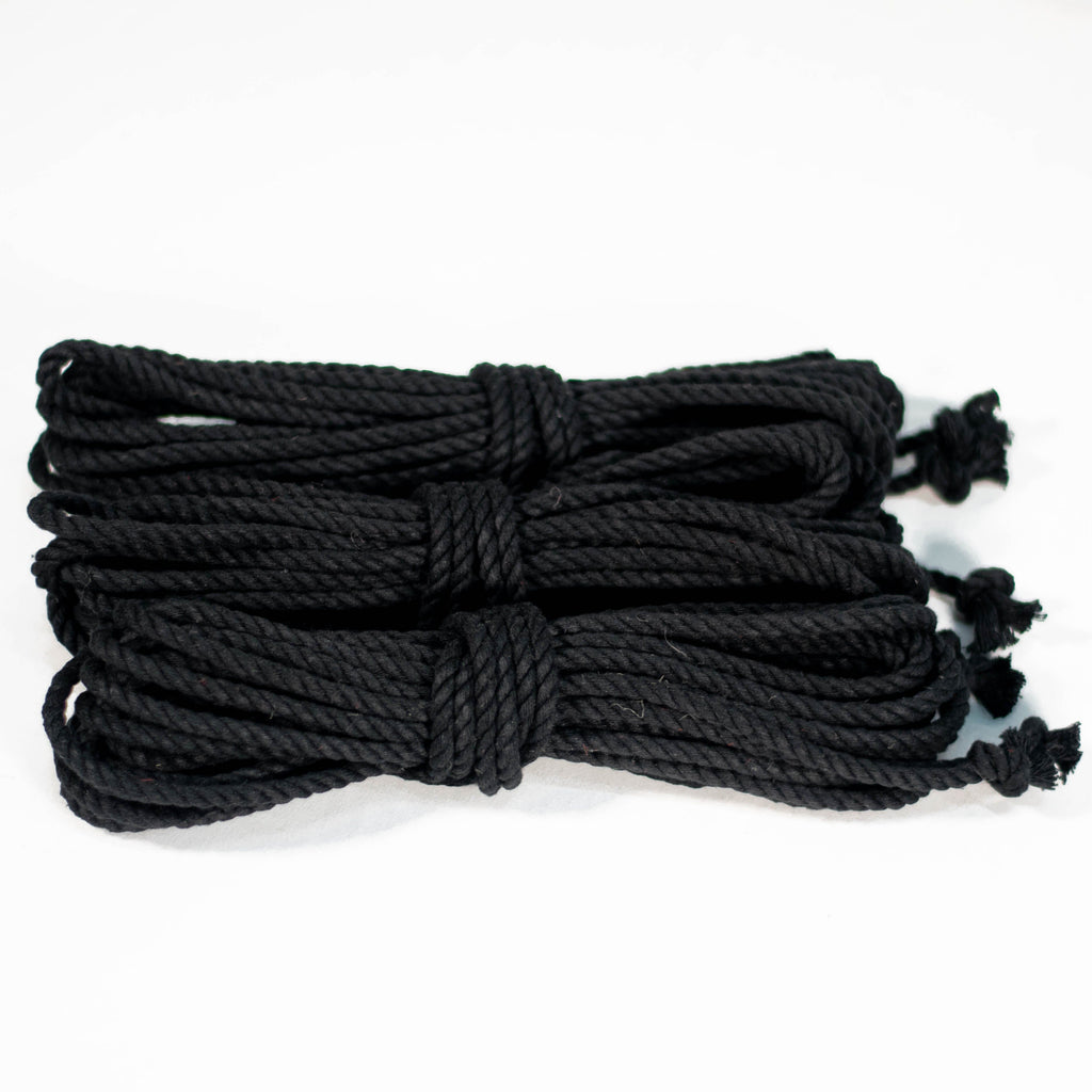 3 coiled black cotton ropes with knots on the end, displayed on a white background.